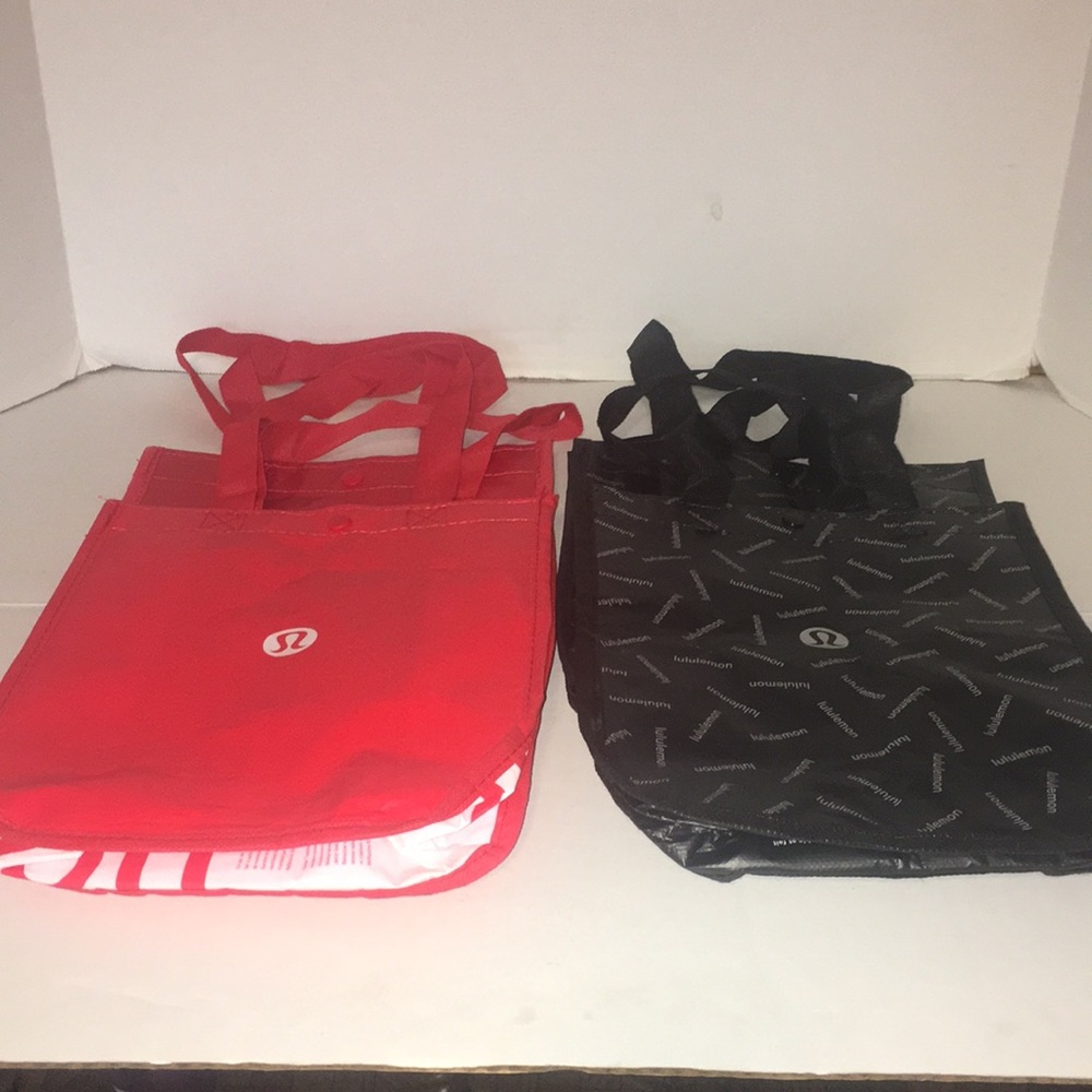 LULULEMON LOT OF 4 YOGA/GYM/REUSABLE TOTE BAGS 9x12 SINGLE CLOSURE ON TOP.